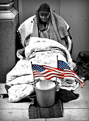 Homeless Man with Two Flags in NYC